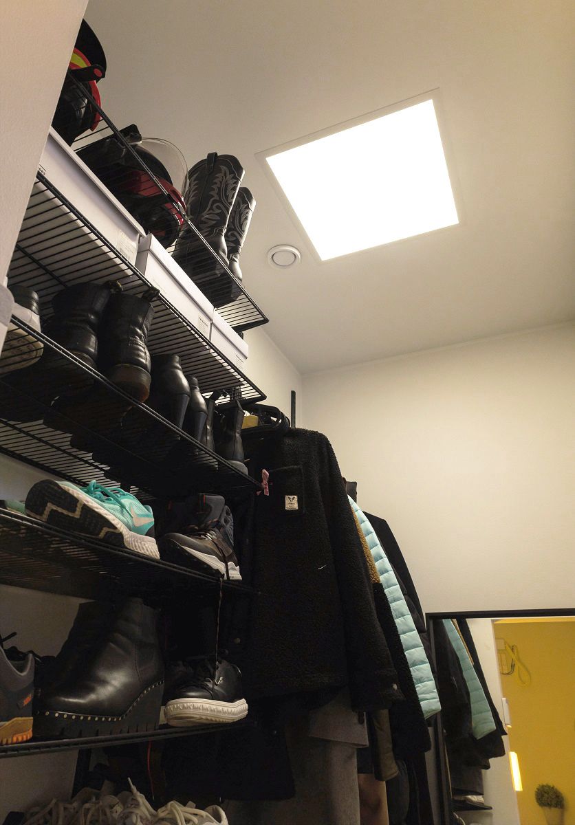 Warehouse lighting with panel lighting.